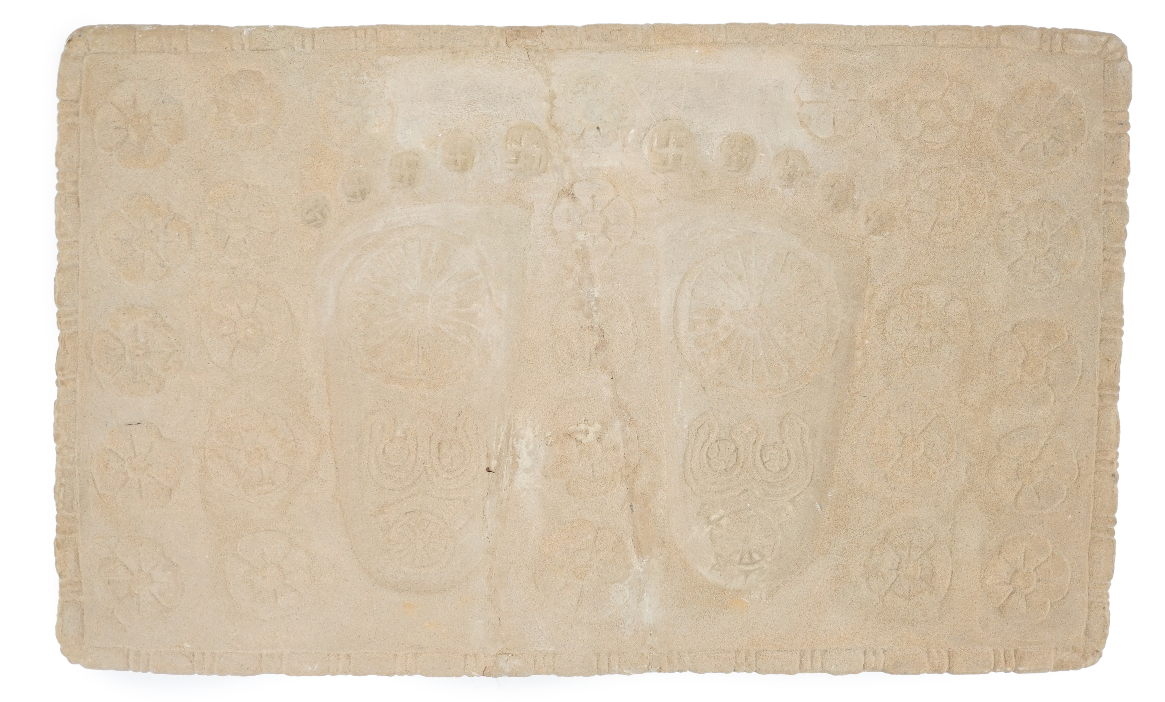 A sandstone relief of Buddha’s foot prints (Buddhapada), Southern India, 12th century